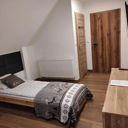 ゲストハウス Dom Na Brzoskwiniowej ウストロン